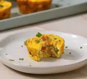 image of a half-eaten Make Ahead Egg Bits on a plate