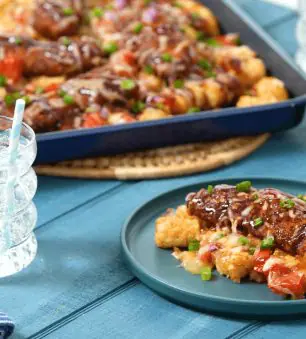 sweet & spicy bbq totchos served on a plate